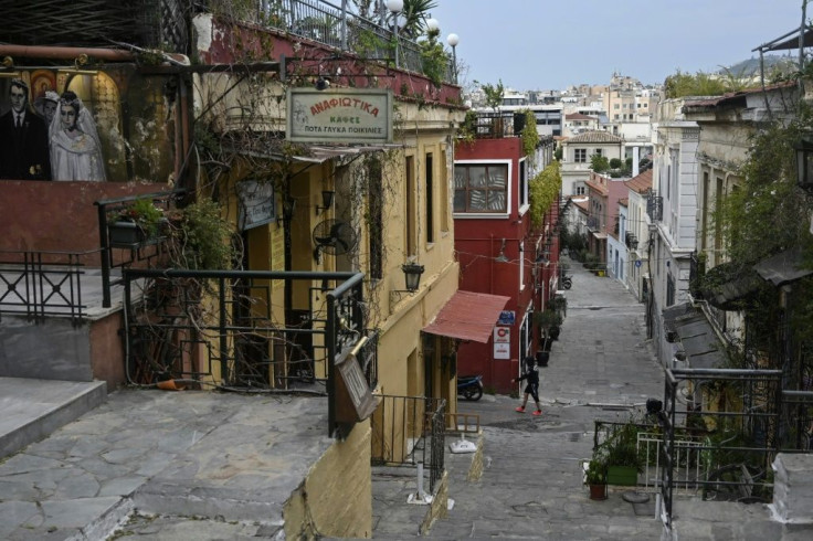 Cafes and taverns are closed in the popular Plaka tourist district of Athens during a lockdown aimed at curbing the spread of the COVID-19 pandemic