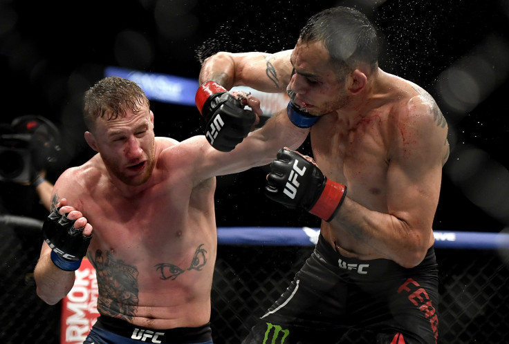 Justin Gaethje (L) of the United States punches Tony Ferguson (R) of the United States in their Interim lightweight title fight during UFC 249 at VyStar Veterans Memorial Arena