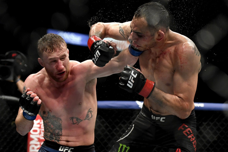 Justin Gaethje (L) of the United States punches Tony Ferguson (R) of the United States in their Interim lightweight title fight during UFC 249 at VyStar Veterans Memorial Arena