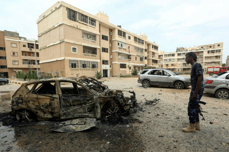 At least four civilians, including a five-year-old girl, were killed and 16 others wounded in the working-class neighbourhoods of Abu Slim and Ben Gashir south of the city, a health ministry spokesman said