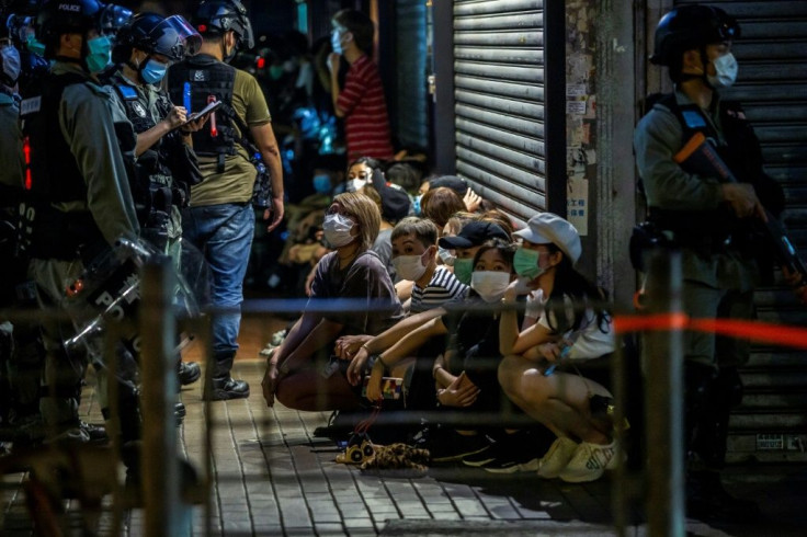 Police detain a group of people during a pro-democracy protest calling for Hong Kong's independence from China on Mother's Day 2020