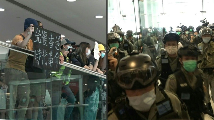 Riot police chase Hong Kong Mother's Day 2020 protesters