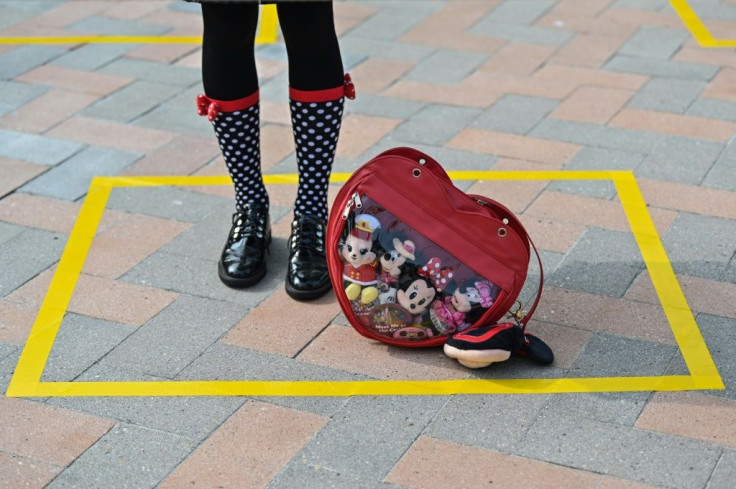 Visitors have been told to maintain social distancing at all times, and yellow lines and posters on the ground show them where to stand when waiting