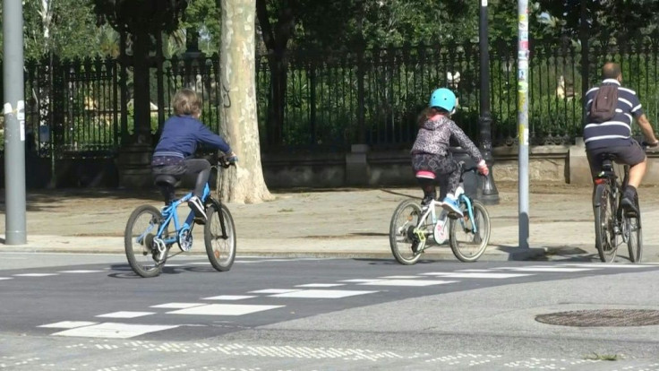 Spanish children play outside in the sunshine as the country slowly phases its way out of lockdown