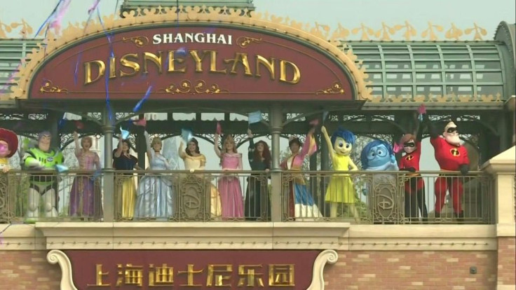 Mickey Mouse leads the pomp and ceremony at Shanghai Disneyland as the theme park reopens after a coronavirus virus enforced shutdown.