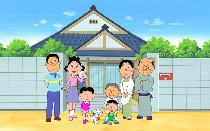 An image from the "Sazae-san" TV cartoon series -- the world's longest-running -- with the character Sazae-san (2nd L) and her family in front of their house, is shown in this handout received from the Hasagawa Michiko Art Museum in Tokyo