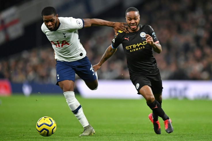 Manchester City's Raheem Sterling (right) has expressed concern over a quick return for the Premier League