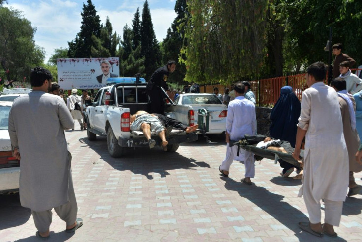 Injured mourners are taken to hospital after a suicide bomb attack on a funeral in eastern Afghanistan