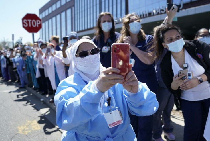 Frontline hospital employees in Oceanside, New York hold a parade to honor medics
