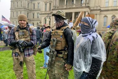 Armed demonstrators protest stay-at-home orders in Lansing, Michigan on May 14, 2020
