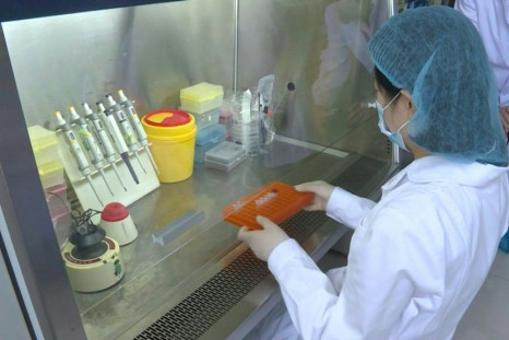Fresh tests for Wuhan as cluster sparks mass virus screening