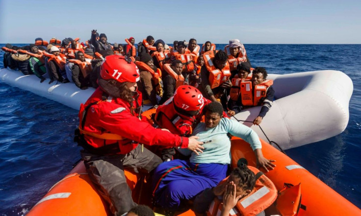 Members of the Spanish NGO Maydayterraneo prepare to sail back to the Aita Mari rescue boat with around 90 migrants in February