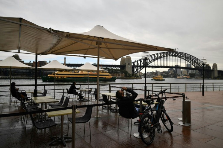Sydney's city centre remained eerily quiet even as baristas, waiters and barmaids returned to work