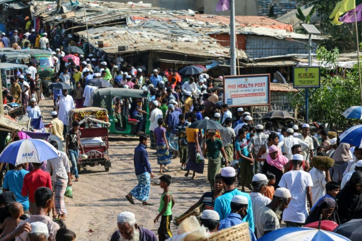 After the first coronavirus cases were confirmed, Rohingya refugees roamed the camps' markets, many of them without masks