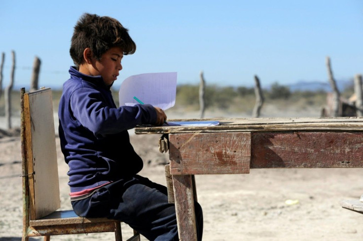 Gonzalo Lencinas, 10, does his homework in El Retamo, Mendoza Province, where most children have no access to distance learning via the internet