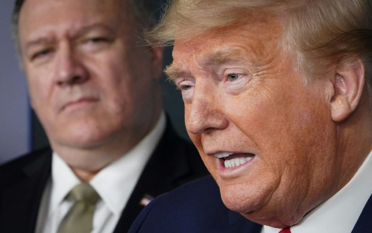 US Secretary of States Mike Pompeo listens as US President Donald Trump speaks on the COVID-19 coronavirus at an April 2020 press conference at the White House
