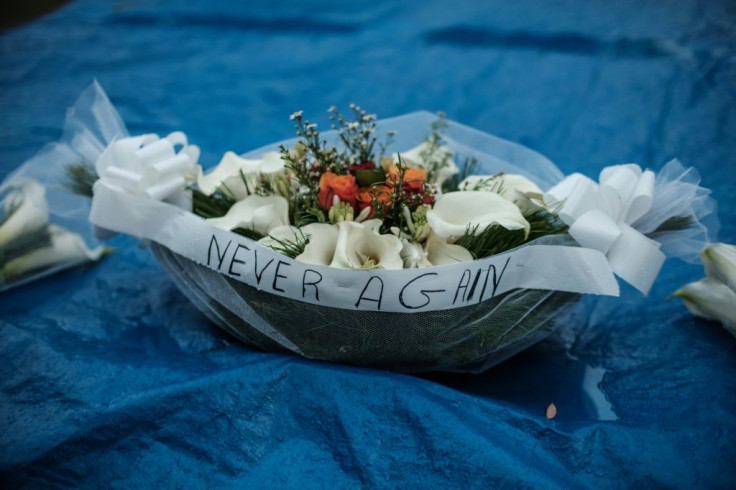 Floral offerings at a mass grave at the Kigali Genocide Memorial