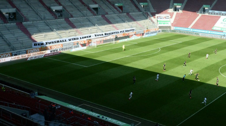 Augsburg fans show their unhappiness at the Bundesliga restarting amid a global virus pandemic