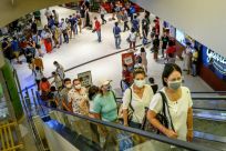 Shoppers flocked to Thailand's top-end malls, eager for retail therapy as shopping centres reopened
