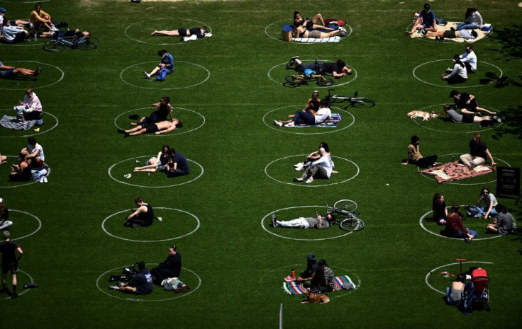 People practise social distancing at a park in Brooklyn, New York. The United States has the world's highest number of coronavirus infections and deaths