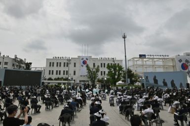 South Koreans attend a ceremony marking the 40th anniversary of the pro-democracy Gwangju Uprising