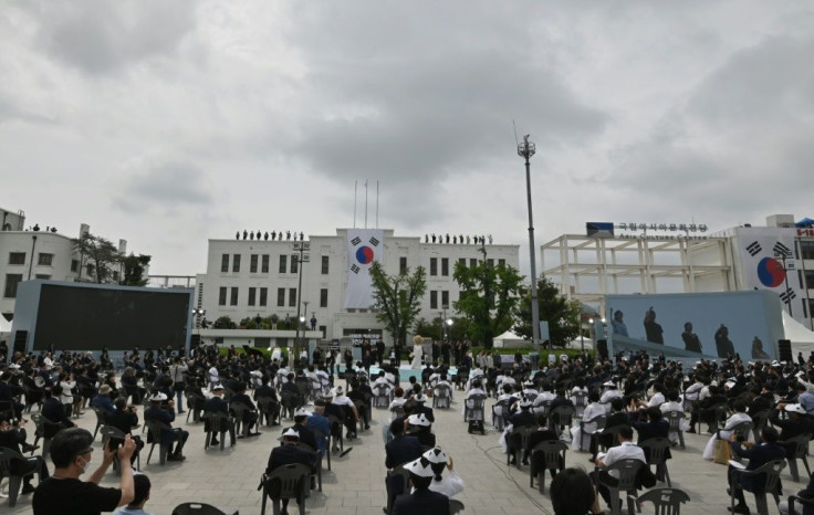 South Koreans attend a ceremony marking the 40th anniversary of the pro-democracy Gwangju Uprising