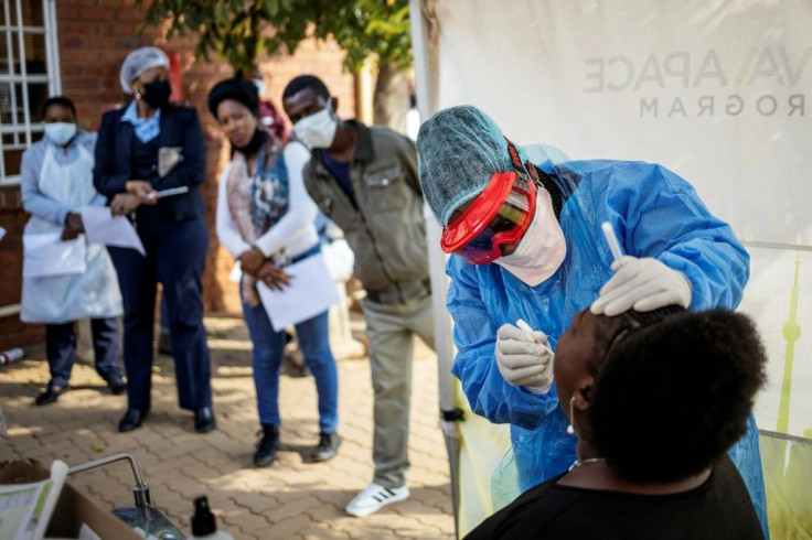 A Doctors Without Borders nurse performs a swab test for COVID-19 in Lenasia, Johannesburg