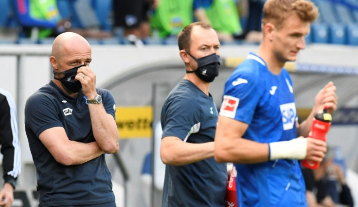 Hoffenheim coach Alfred Schreuder wore a mask on the sidelines during his side's defeat to Hertha Berlin