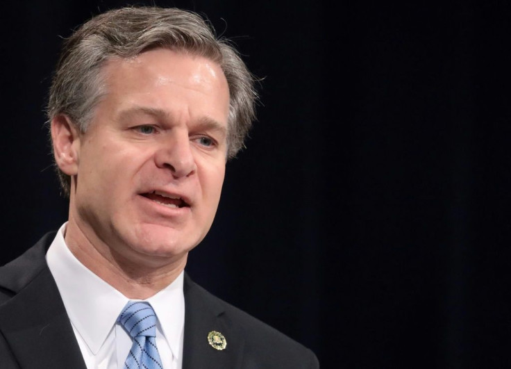 FBI DirectorÂ Christopher WrayÂ says encrypted files on Alshamrani's cell phone showed his ties to al-Qaeda