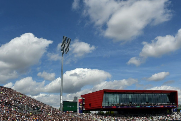Fans watch a match between England and Afghanistan at Old Trafford during the 2019 Cricket World Cup