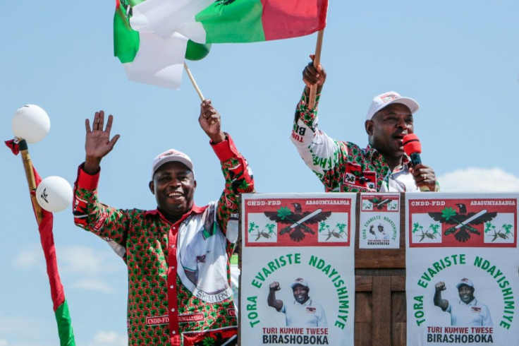 President Pierre Nkurunziza, right, and his hand-picked political heir, Evariste Ndayishimiye, who is contesting the presidential elections for the rulling CNDD-FDD party