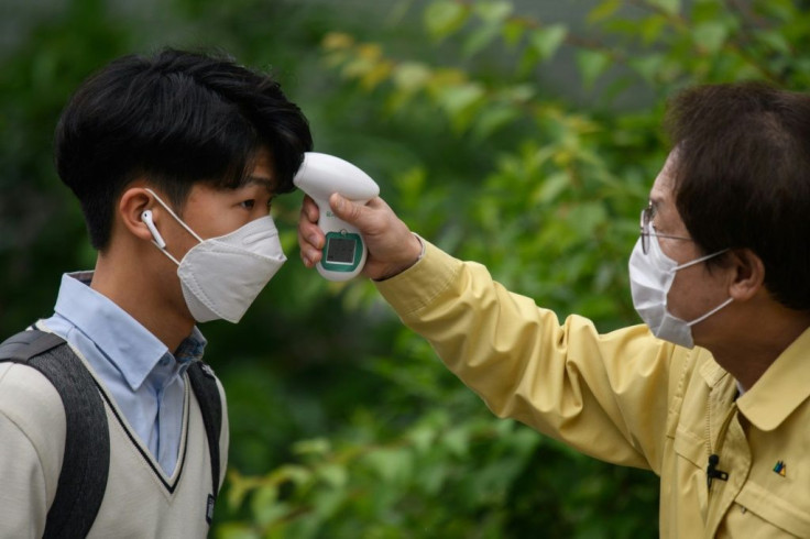 Hundreds of thousands of South Korean students have returned to school after a delay of more than two months because of the coronavirus outbreak