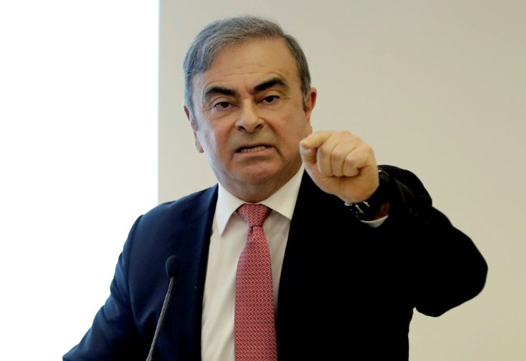 In this photo taken on January 8, 2020 in Beirut, former Renault-Nissan boss Carlos Ghosn addresses a large crowd of journalists on his reasons for dodging trial in Japan, where he is accused of financial misconduct