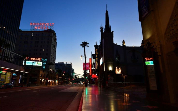 An empty Hollywood Boulevard, where tourists once flocked for film premieres, as reopenings in California virus hotspot Los Angeles County faces delays