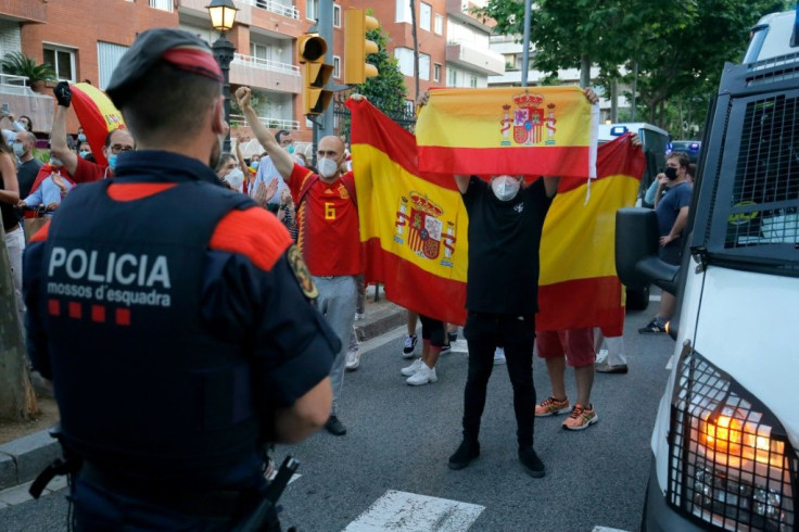 Protesters gather in Barcelona against the Spanish government's measures during the national lockdown to prevent the spread of COVID-19