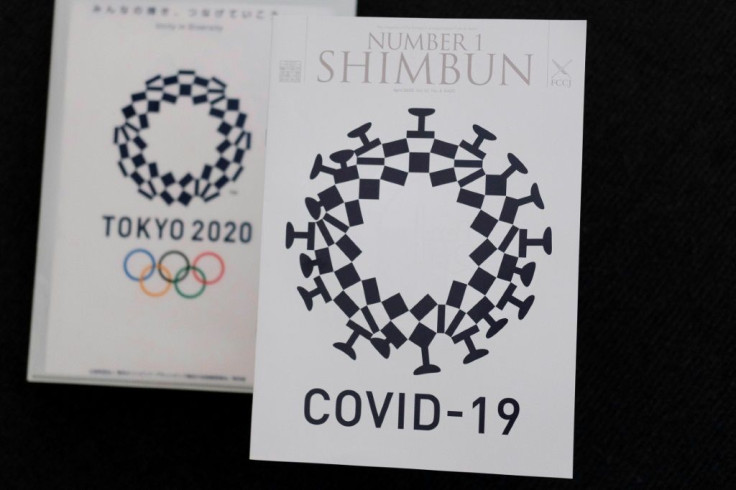 This photo taken May 21, 2020 in Tokyo shows the cover design of Number 1 Shimbun (R), the monthly magazine for members of the Foreign Correspondents' Club of Japan, which was designed by Andrew Pothecary, and the logo of Tokyo 2020 Olympic Games (L)