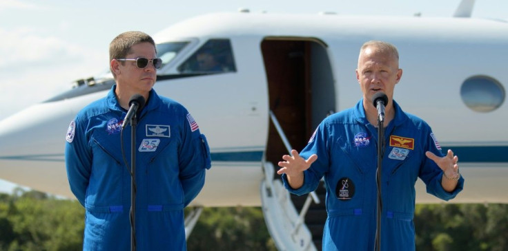 NASA astronauts Robert Behnken (L) and Douglas Hurley