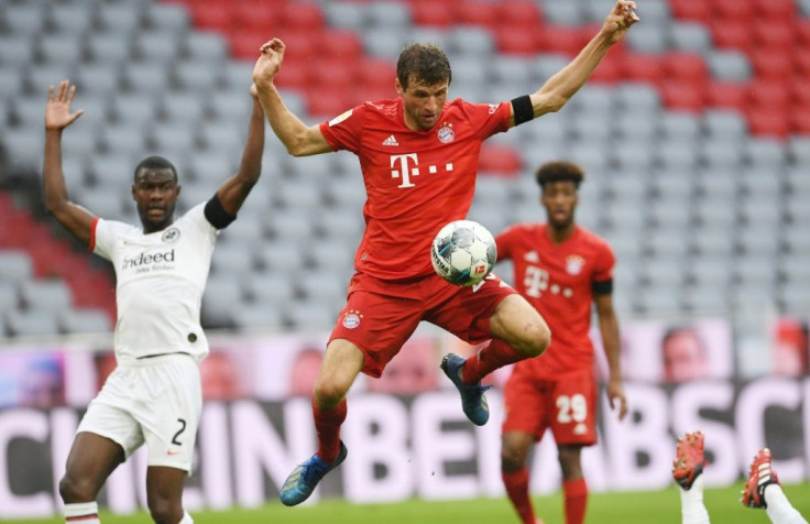 Bayern Munich forward Thomas Mueller controls the ball just before scoring in Saturday's 5-2 win at home to Eintracht Frankfurt.