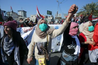 Iraqi students during an anti-government demonstration in Baghdad's Tahrir square in February, a month before the spread of coronavirus escalated into a major global crisis