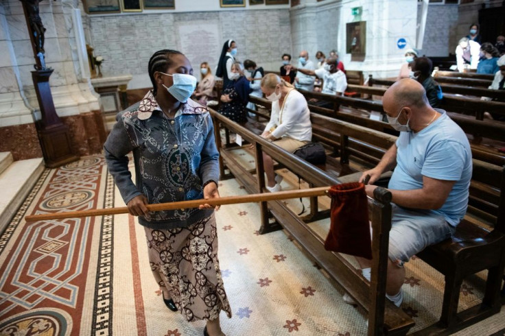 French churches reopened for their first Sunday mass with protective measures in place