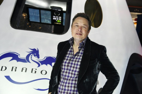 SpaceX founder Elon Musk (pictured with the Dragon capsule in May 2014) said the company started with "just a few people, who didn't really know how to make rockets"