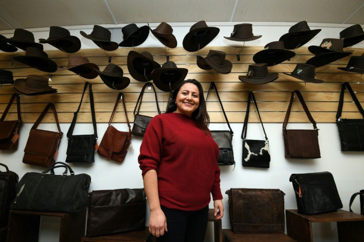 After the fires, Lorena Granados and her husband set up an ad-hoc market stall in front of the ashes of their shop