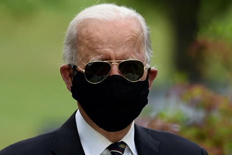 Democratic presidential candidate Joe Biden wears a black face mask during his first public appearance in more than two months