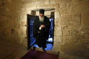 Bishop Theophylactos reopens Bethlehem's Church of the Nativity, built on the spot where Christians believe Jesus was born, as Palestinian authorities ease coronavirus restrictions in the occupied West Bank