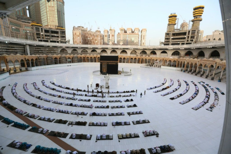 Exceptionally, Mecca's Grand Mosque hosted Eid al-Fitr prayers, marking the ned of Ramadan, on Sunday with Saudi security forces keeping a watchful eye between well-spaced rows of worshippers