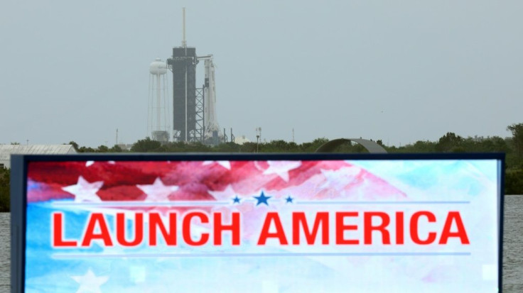 A SpaceX Falcon 9 rocket with the Crew Dragon spacecraft sits atop launch complex 39A at the Kennedy Space Center in Florida on May 25, 2020