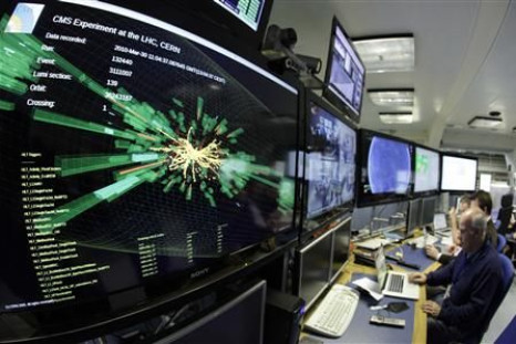 A graphic showing a collision at full power is pictured at the CMS experience control room of the LHC at the CERN in Meyrin