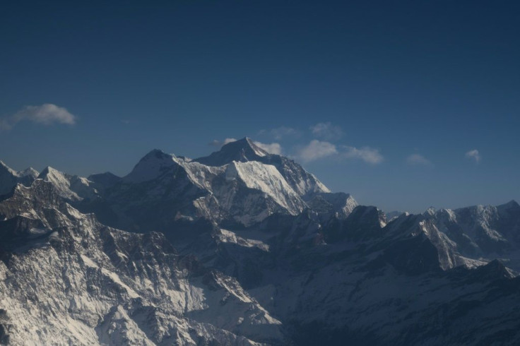 The state-backed expedition is the first this year to reach the top of the mountain after China and Nepal in March suspended the busy spring climbing season