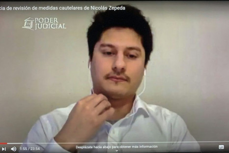 An image grab shows Nicolas Zepeda attending a virtual court on his extradition case in Santiago, on May 27, 2020
