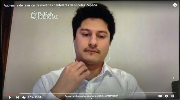 An image grab shows Nicolas Zepeda attending a virtual court on his extradition case in Santiago, on May 27, 2020